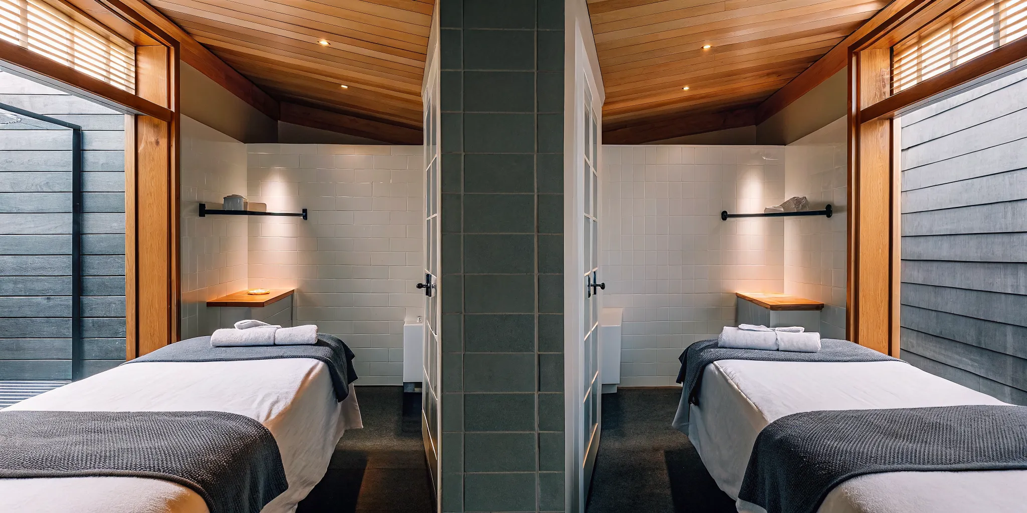 A serene massage room ready for an ashiatsu or a deep tissue massage.