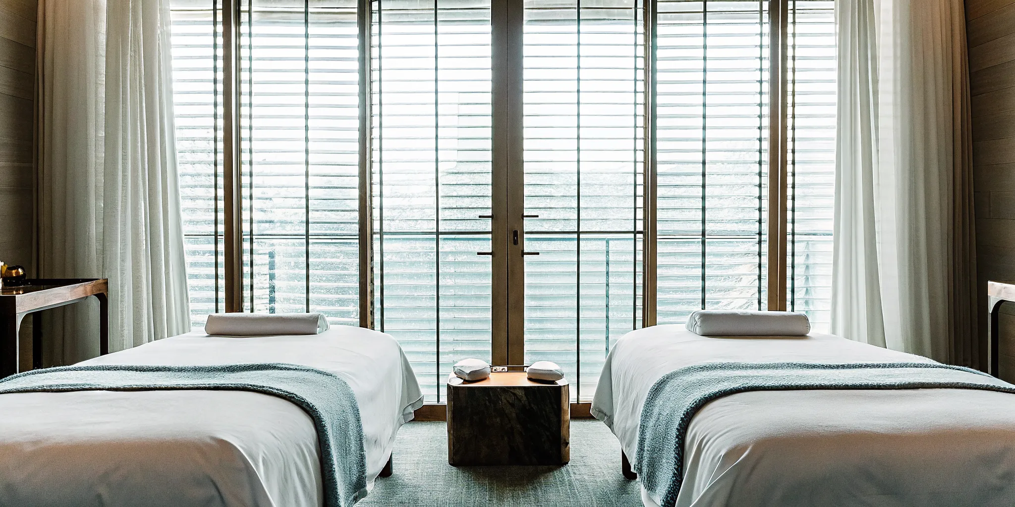 Side by side massage tables for a couples massage price guide