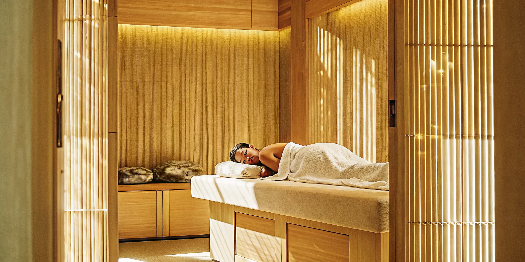Athletic adult receiving a recovery massage after a workout