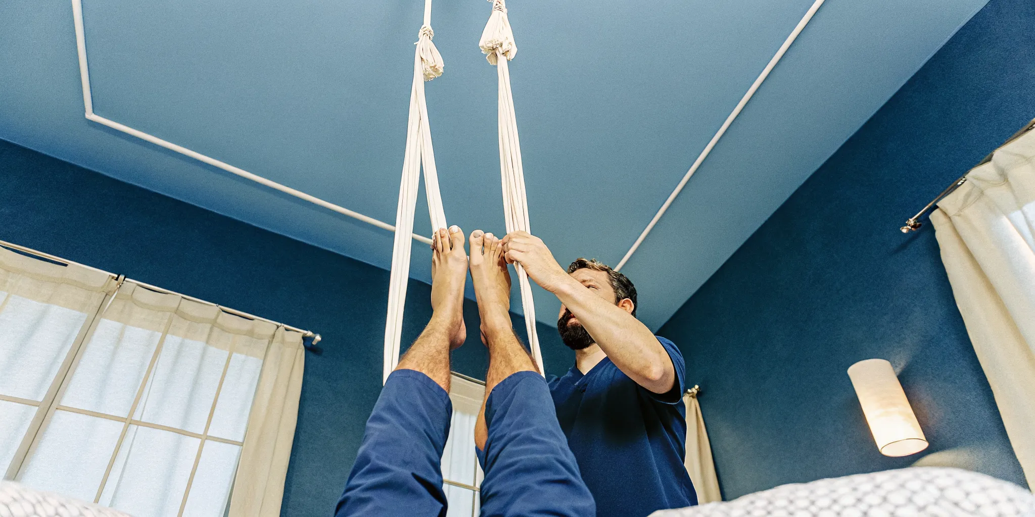 Ashiatsu Barefoot Massage: Overhead Bar Therapy Explained