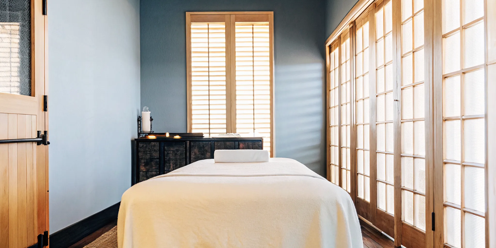 Peaceful massage therapy room with natural light at NOLA Bliss Massage in New Orleans